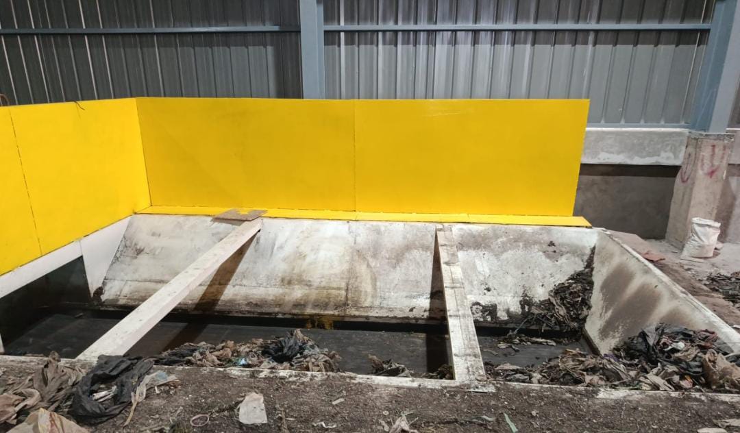 Industrial waste sorting line with conveyor belts and automated recycling equipment